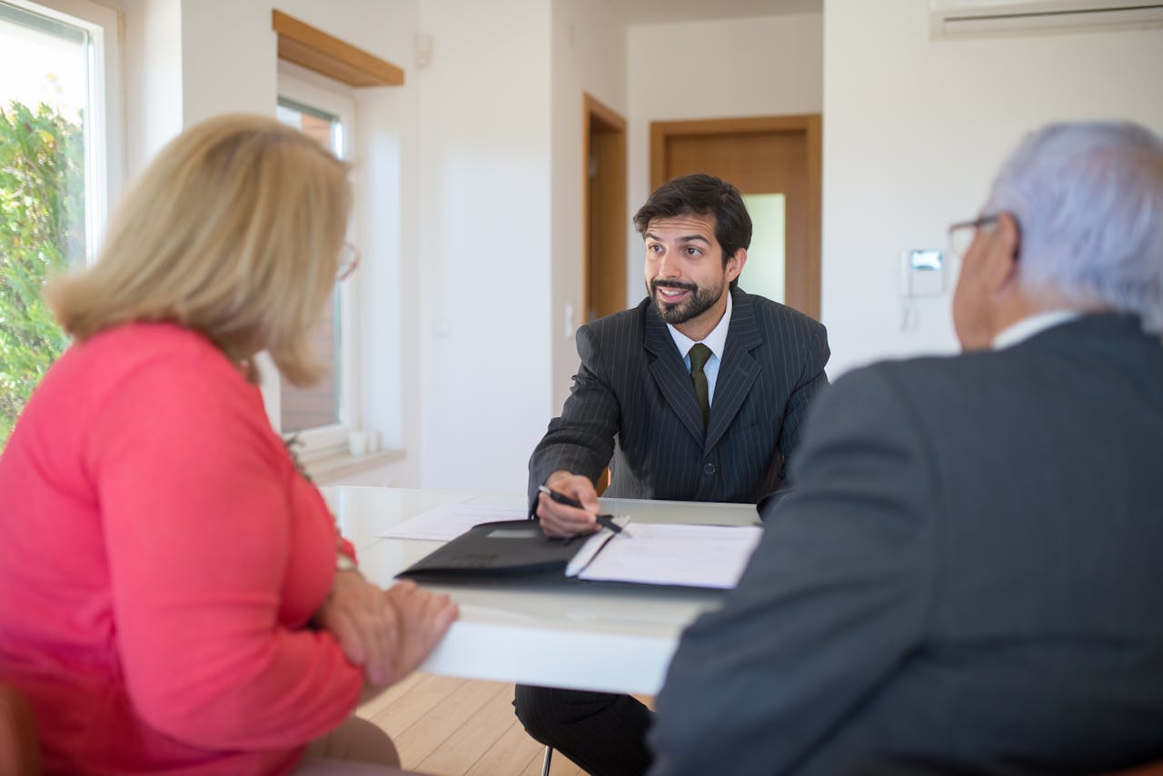 Advisor discussing plans with clients